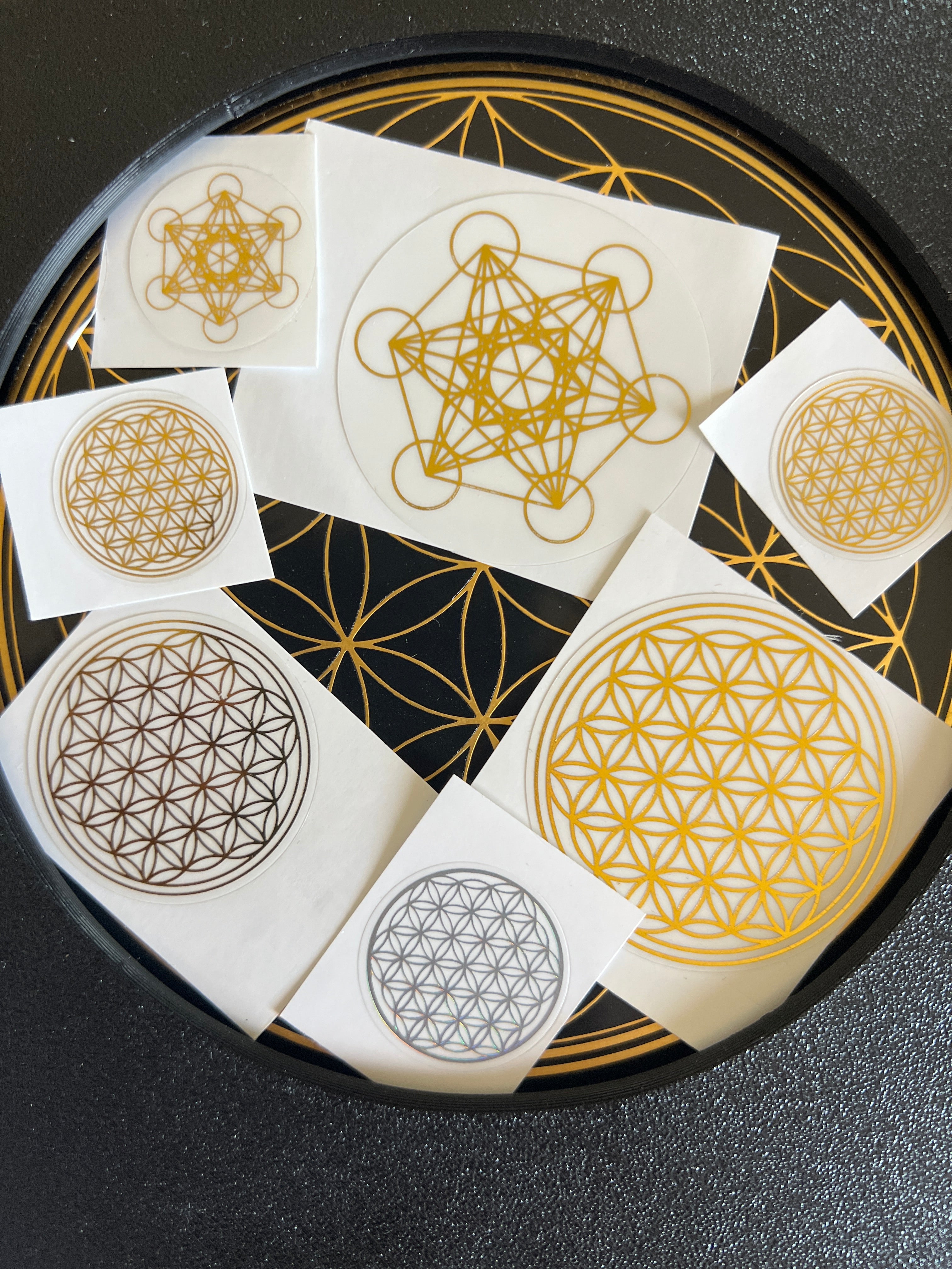 Sacred Ritual Oils Scalar Energetic Patches with gold and black geometric flower of life designs